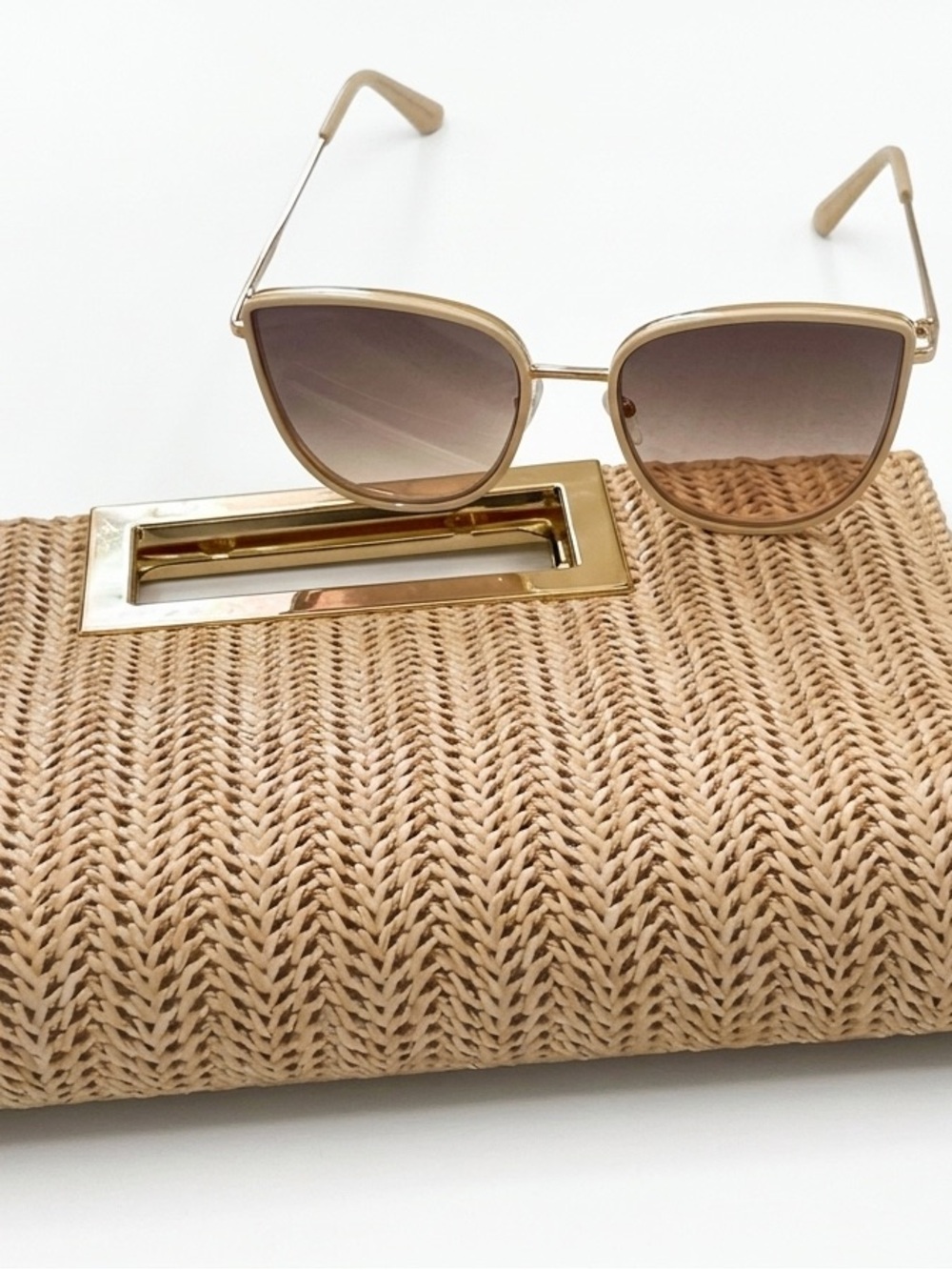 Straw Clutch with Beige Cat-Eye Sunglasses